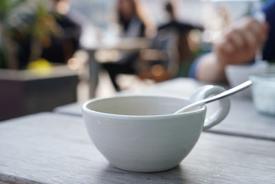 Close-up of coffee cup on table