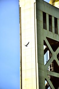 Low angle view of built structure against blue sky