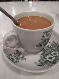 High angle view of coffee on table