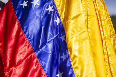 Close-up of colorful flags hanging