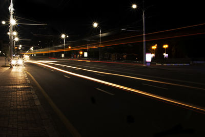 Light trails on city street at night