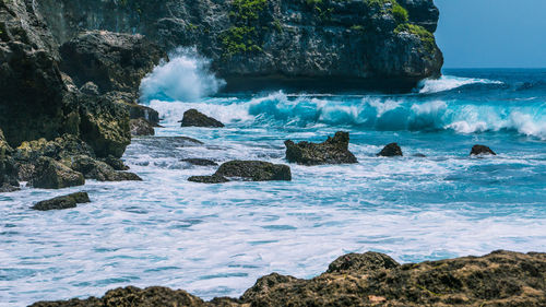 Scenic view of rocks in sea