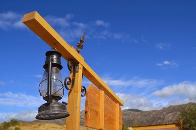 Low angle view of tower against blue sky