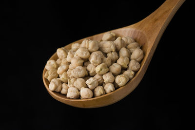 Close-up of coffee beans against black background