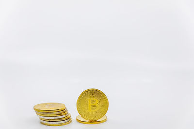 Close-up of coins on white background