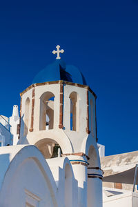 Traditional architecture of the churches of the oia city in santorini island