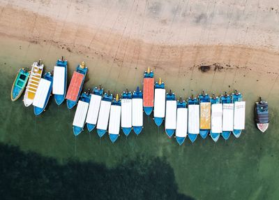 High angle view of boats moored at beach