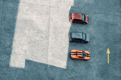 High angle view cars parked on public plaza