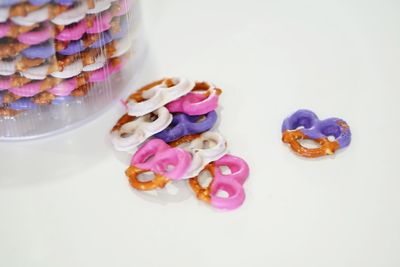 High angle view of multi colored candies on table