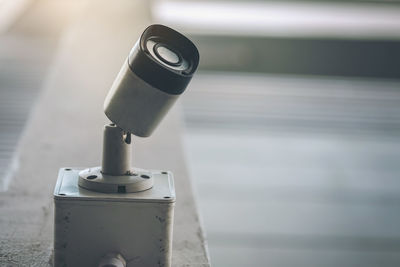 Close-up of camera on table