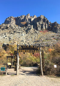 Scenic view of rocky mountains against clear sky