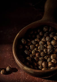 Close-up of coffee beans on table