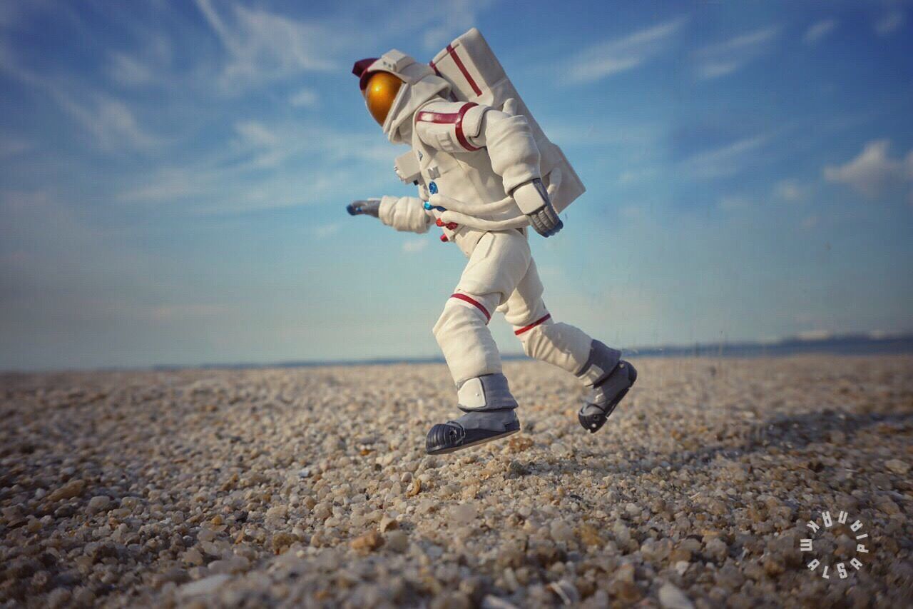 beach, sand, lifestyles, sky, leisure activity, full length, childhood, shore, casual clothing, focus on foreground, selective focus, cloud - sky, men, sea, outdoors, day, surface level, sunlight