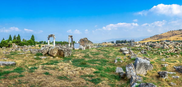 Panoramic view of old ruins against sky