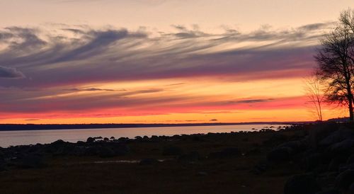 Scenic view of sea against sky at sunset