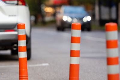 Traffic cones on road in city