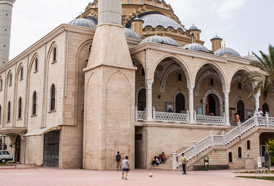 Mosque face against sky