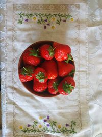 High angle view of strawberries on table