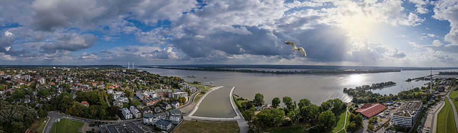 Panoramic view of sea against cloudy sky