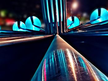 Close-up of illuminated blue car