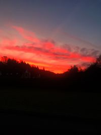 Scenic view of silhouette landscape against sky during sunset