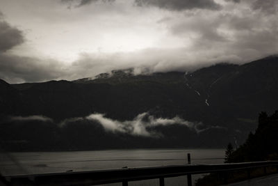 Scenic view of silhouette mountains against sky