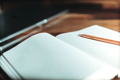 Close-up of paper on table