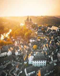 High angle view of townscape against sky during sunset