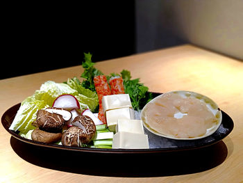 Close-up of food in plate on table