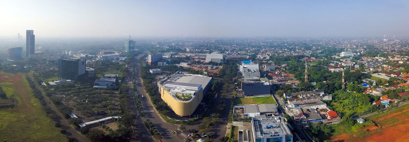 High angle view of buildings in city against sky