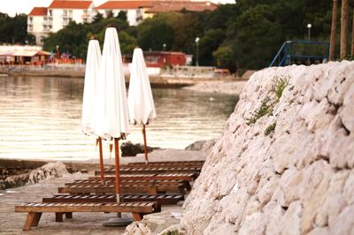 Empty chair in water