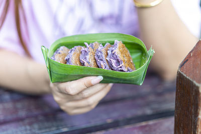 Close-up of woman holding ice cream