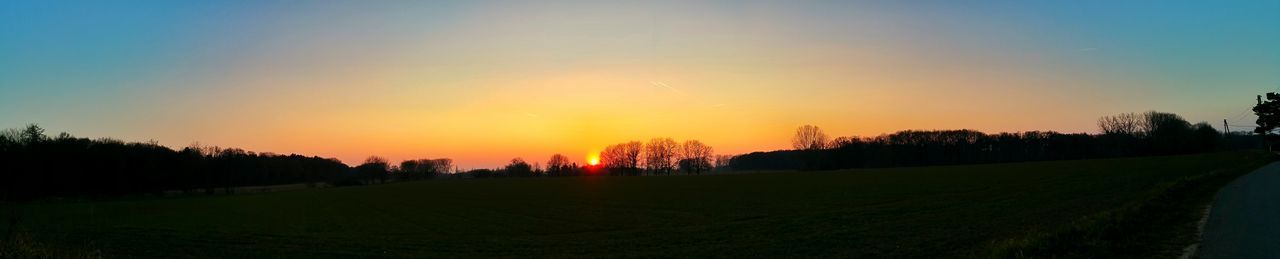 Scenic view of landscape at sunset