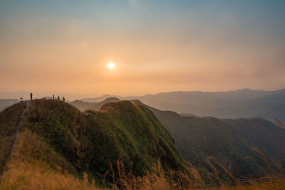 Scenic view of mountains against sky during sunset