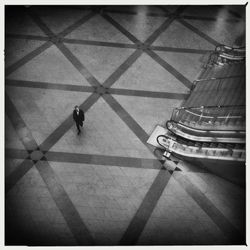 High angle view of businessman walking in subway station