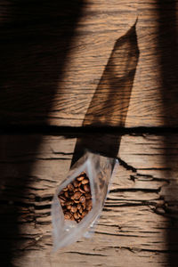 High angle view of dry leaf on table