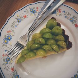 High angle view of vegetables in plate on table