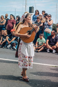 Group of people playing guitar