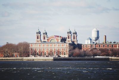 View of river with buildings in background