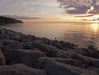 Sunset on a summer evening in hällekis at lake vänern in sweden
