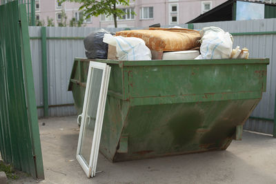 Garbage bin on the street. garbage container for trash. collection of waste in a container.