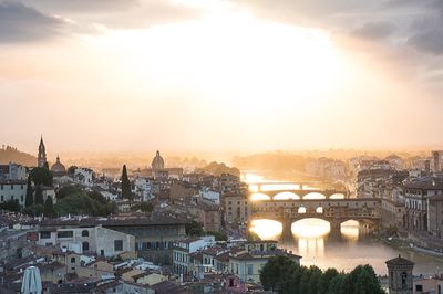 High angle view of cityscape at sunrise