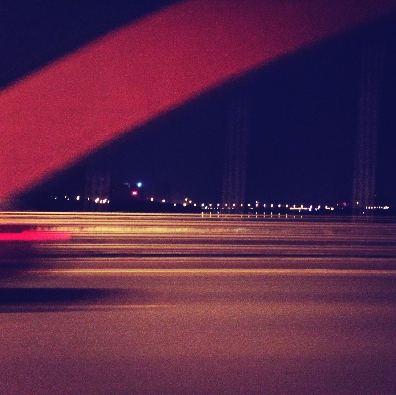 illuminated, night, road, transportation, lighting equipment, street, the way forward, long exposure, road marking, red, light trail, street light, empty, light - natural phenomenon, speed, motion, sky, diminishing perspective, blurred motion, light