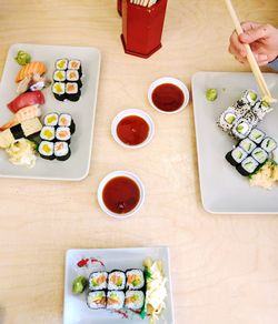 High angle view of sushi served on table