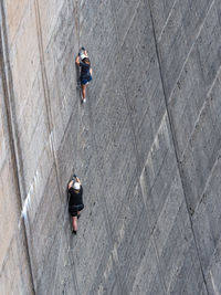 High angle view of people working on street