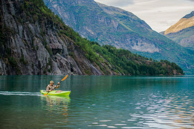 Scenic view of lake in mountains