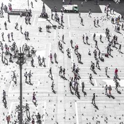 High angle view of people walking in city
