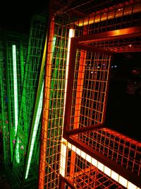 Low angle view of illuminated ceiling at night