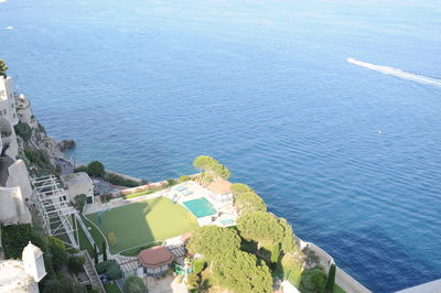 High angle view of sea and buildings