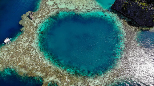 High angle view of blue sea